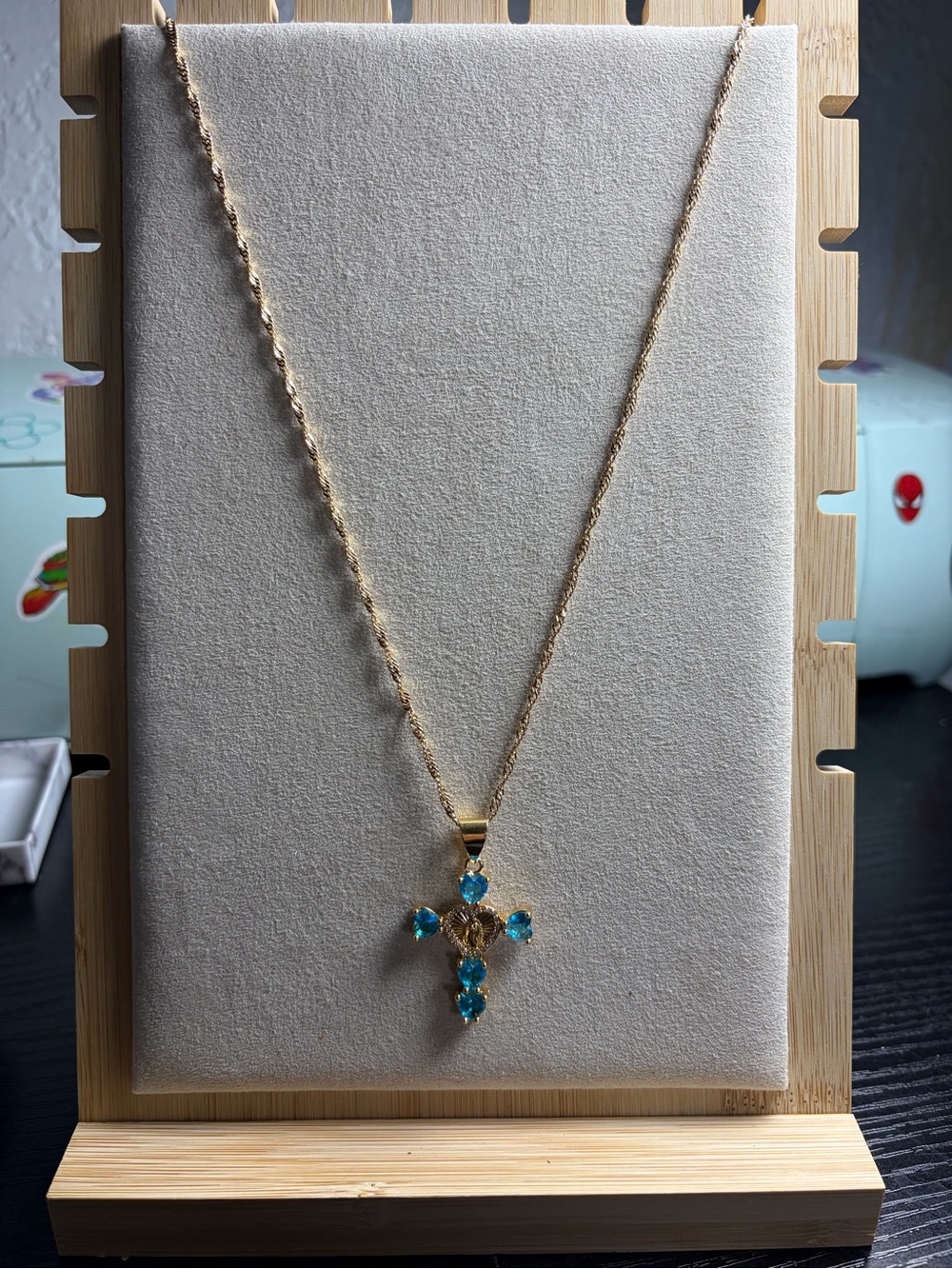 Gold Necklace with Blue Gem Cross Pendant